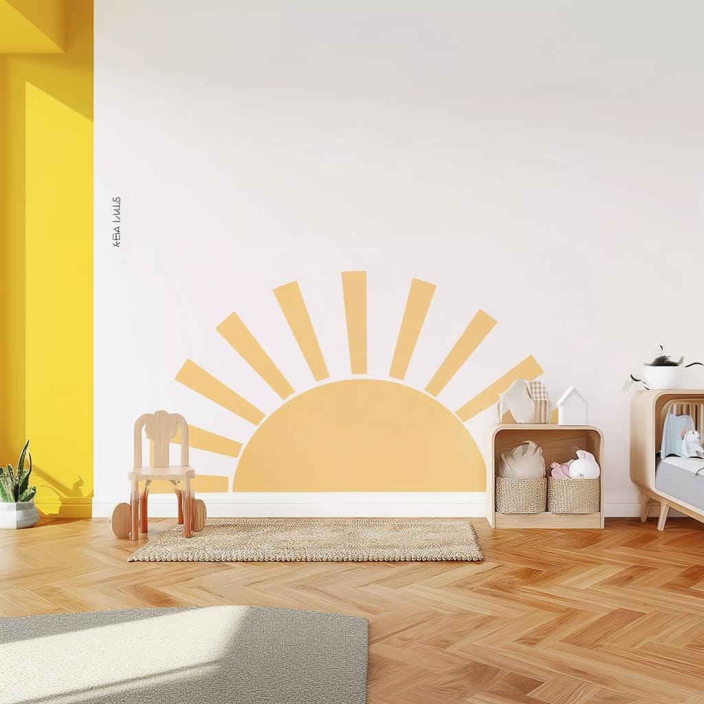 Minimalist sun wall decal in a bright nursery, adding warmth to the space with calming tones.