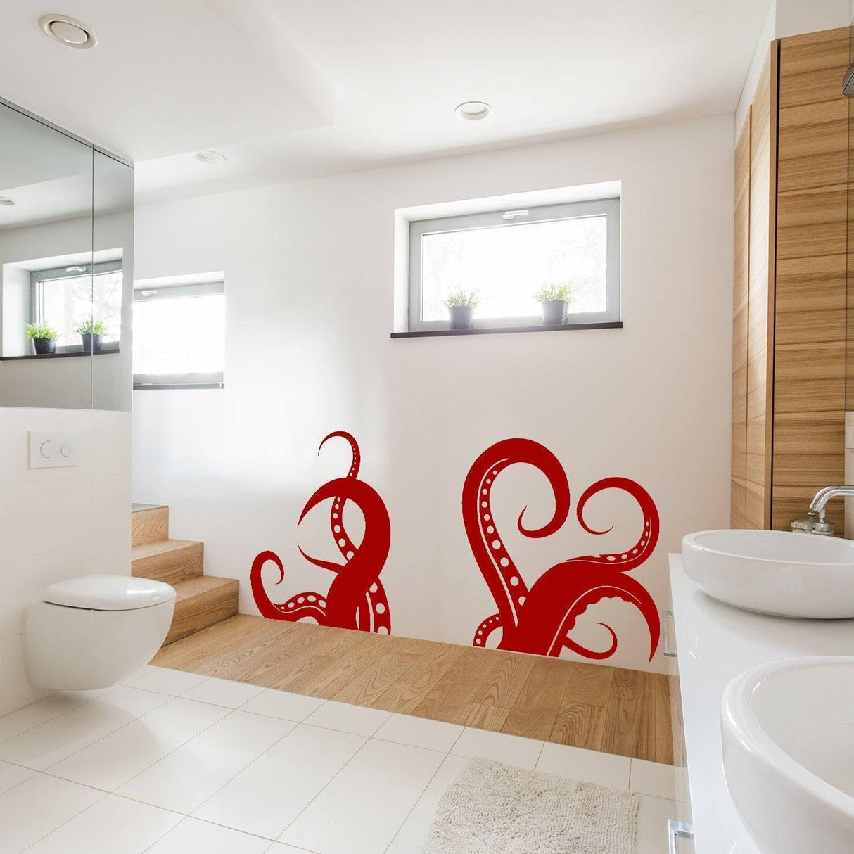 Red octopus vinyl wall sticker in a stylish bathroom, adding a marine theme decoration.