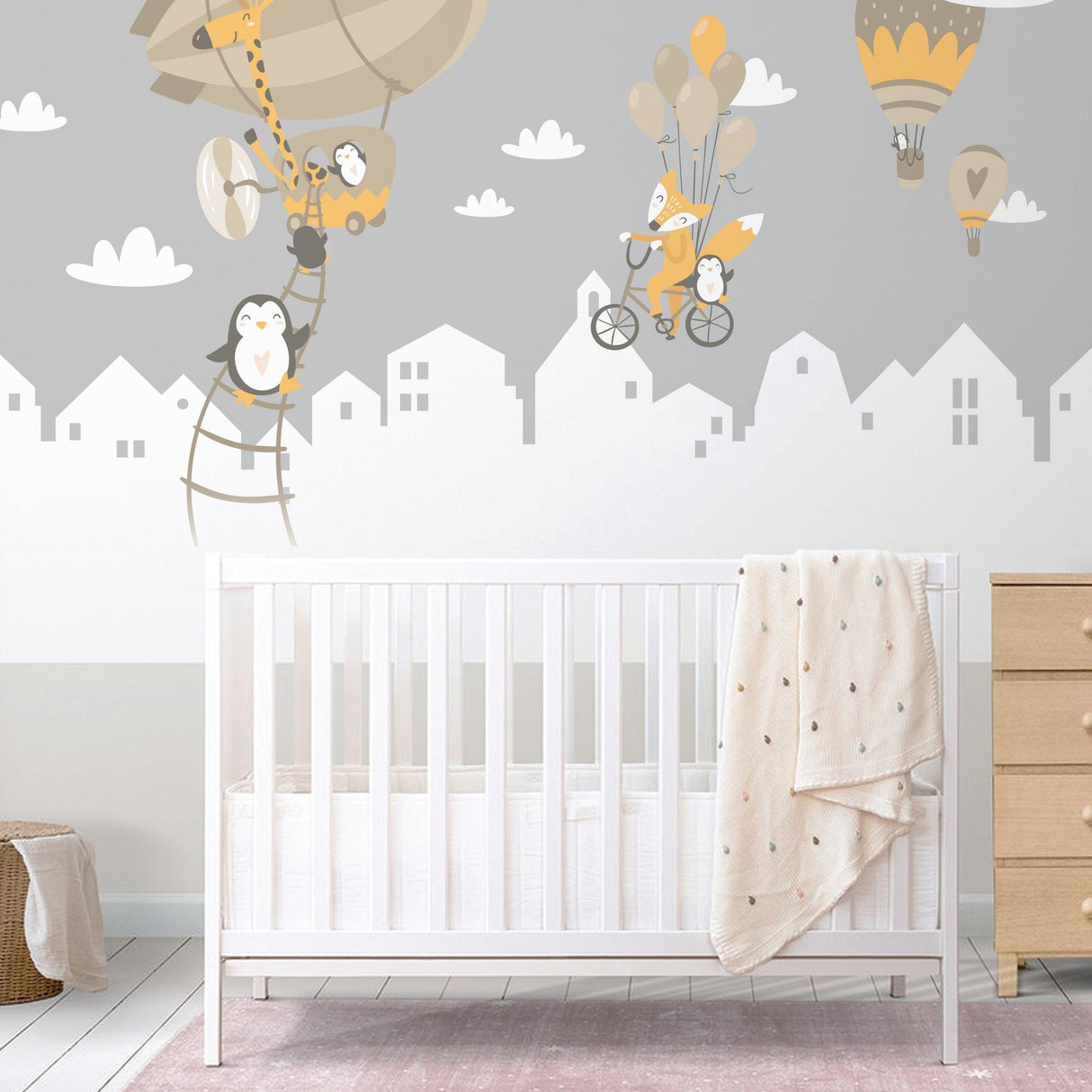 WhimsyLand wall decals featuring penguins and foxes with hot air balloons, perfect for a playful nursery.