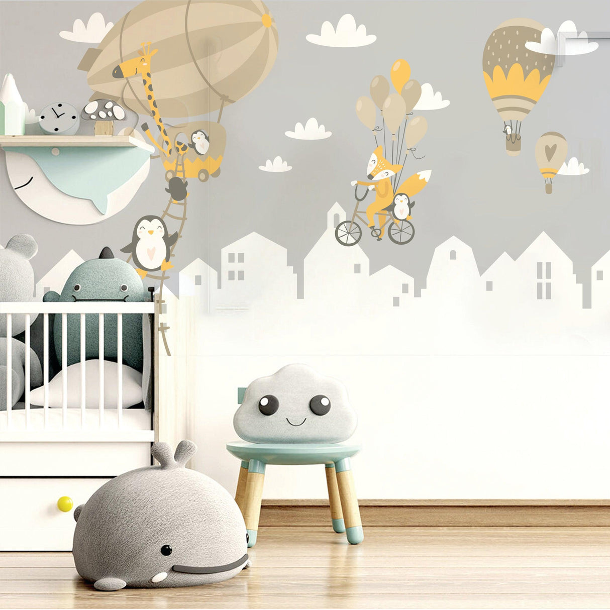 WhimsyLand wall decals featuring penguins, foxes, and hot air balloons decor in a nursery setting.