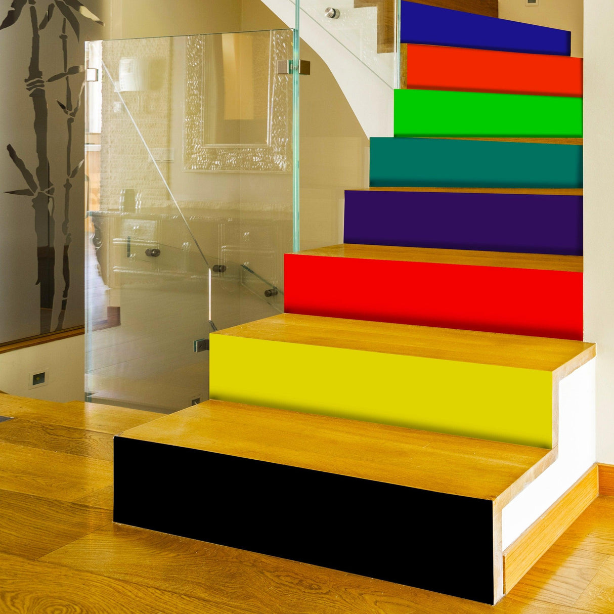 Colorful rainbow stair riser decals transforming wooden steps into vibrant focal points in a modern home.