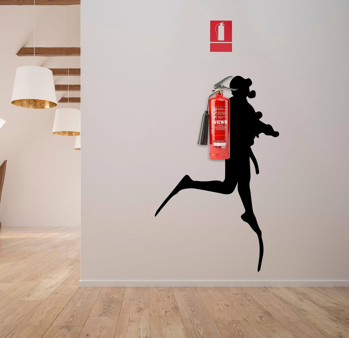 Creative wall art depicting a silhouette of a running figure holding a fire extinguisher, enhancing safety decor.