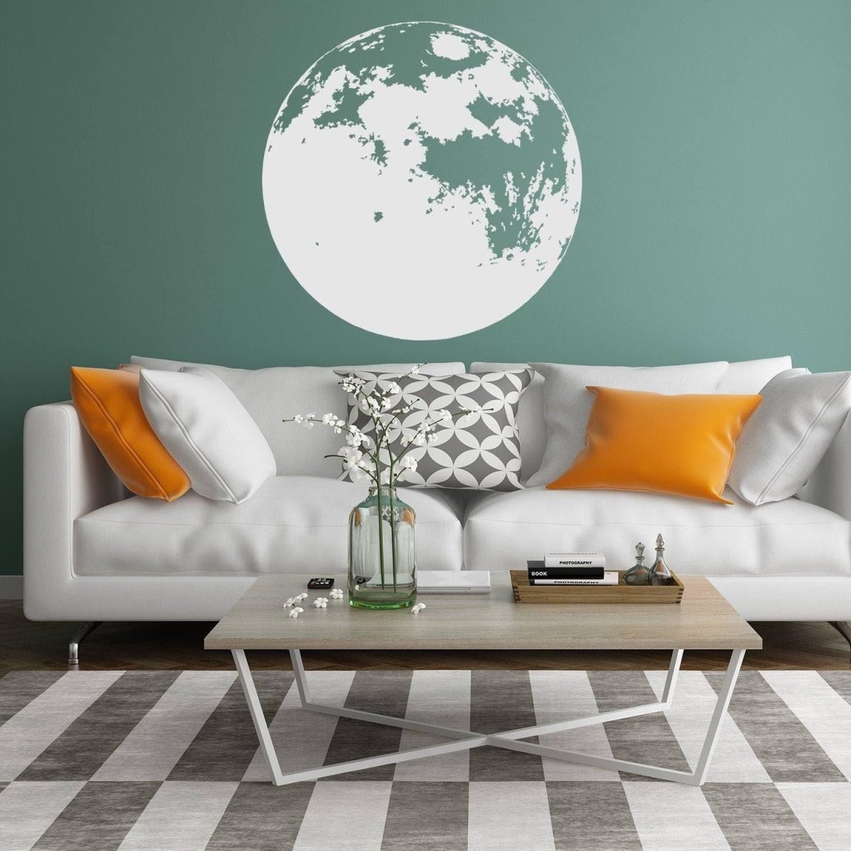 Stylish living room featuring a large moon wall sticker above a modern sofa and coffee table.