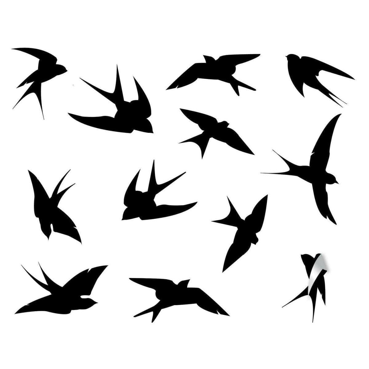Silhouette of 12 stylish bird wall decals in various flying positions, ideal for home decor enhancement.