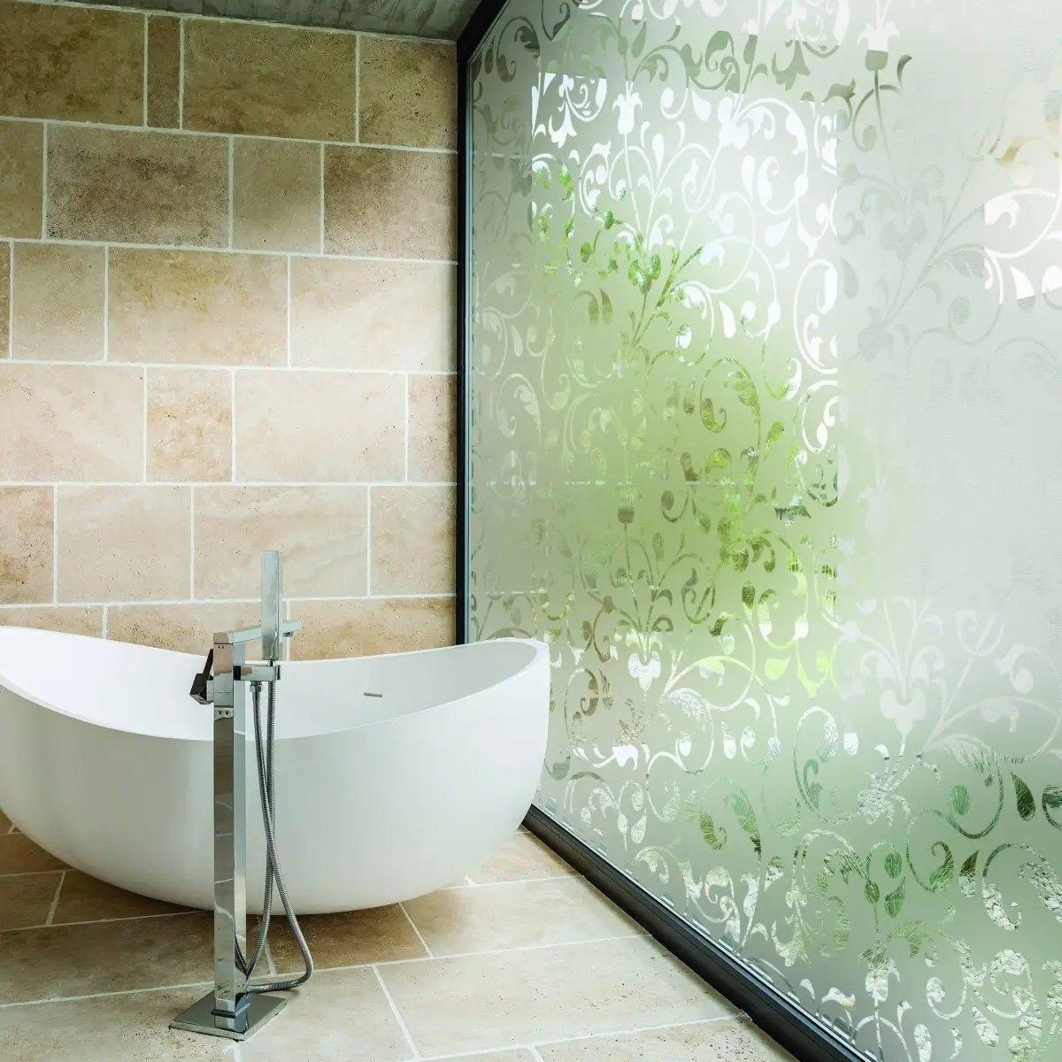 Stylish frosted privacy glass window film in a modern bathroom with elegant decor.