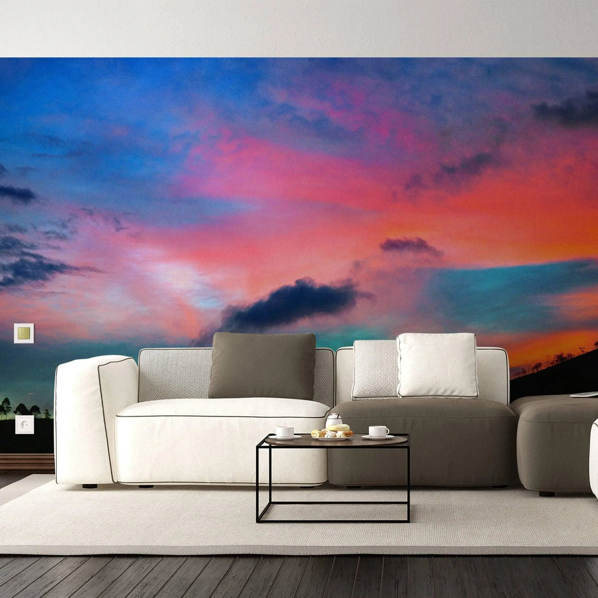 Sunset wall art mural in modern living room, featuring vibrant colors and stylish furniture decor.