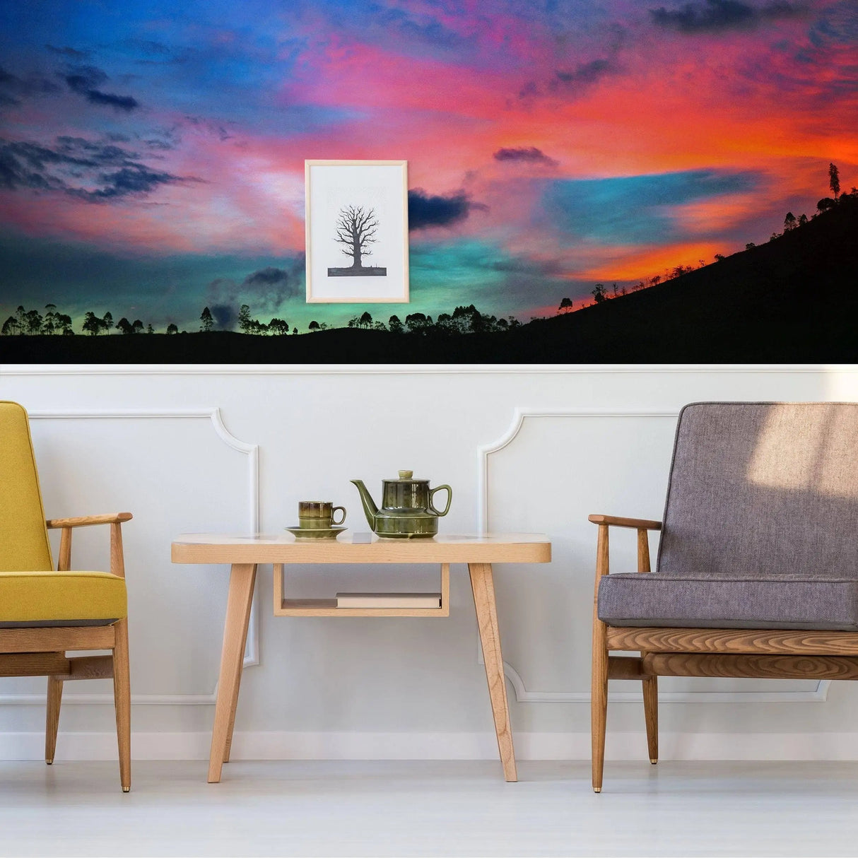 Colorful sunset vinyl wall art creating a serene home decor atmosphere with modern furniture.