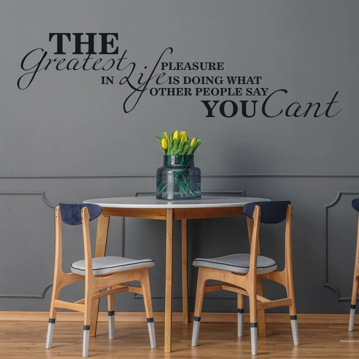 Inspirational vinyl wall decal with motivational quote in stylish dining area, enhancing home decor.