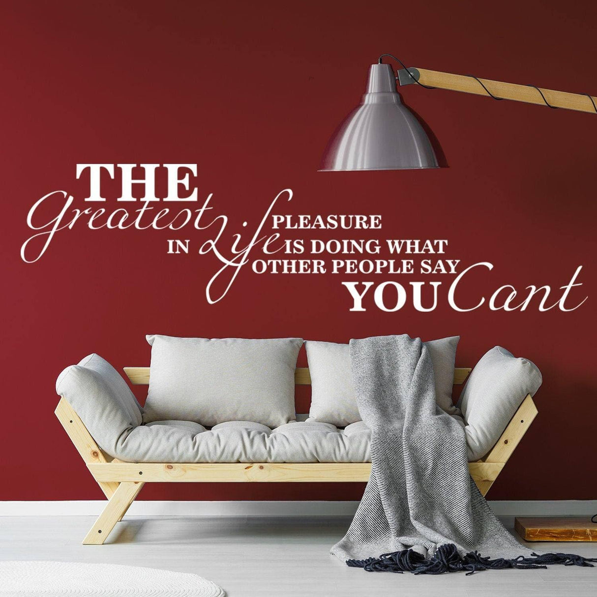 Inspirational wall decal with motivational quote in living room setting, enhancing home interior decor.