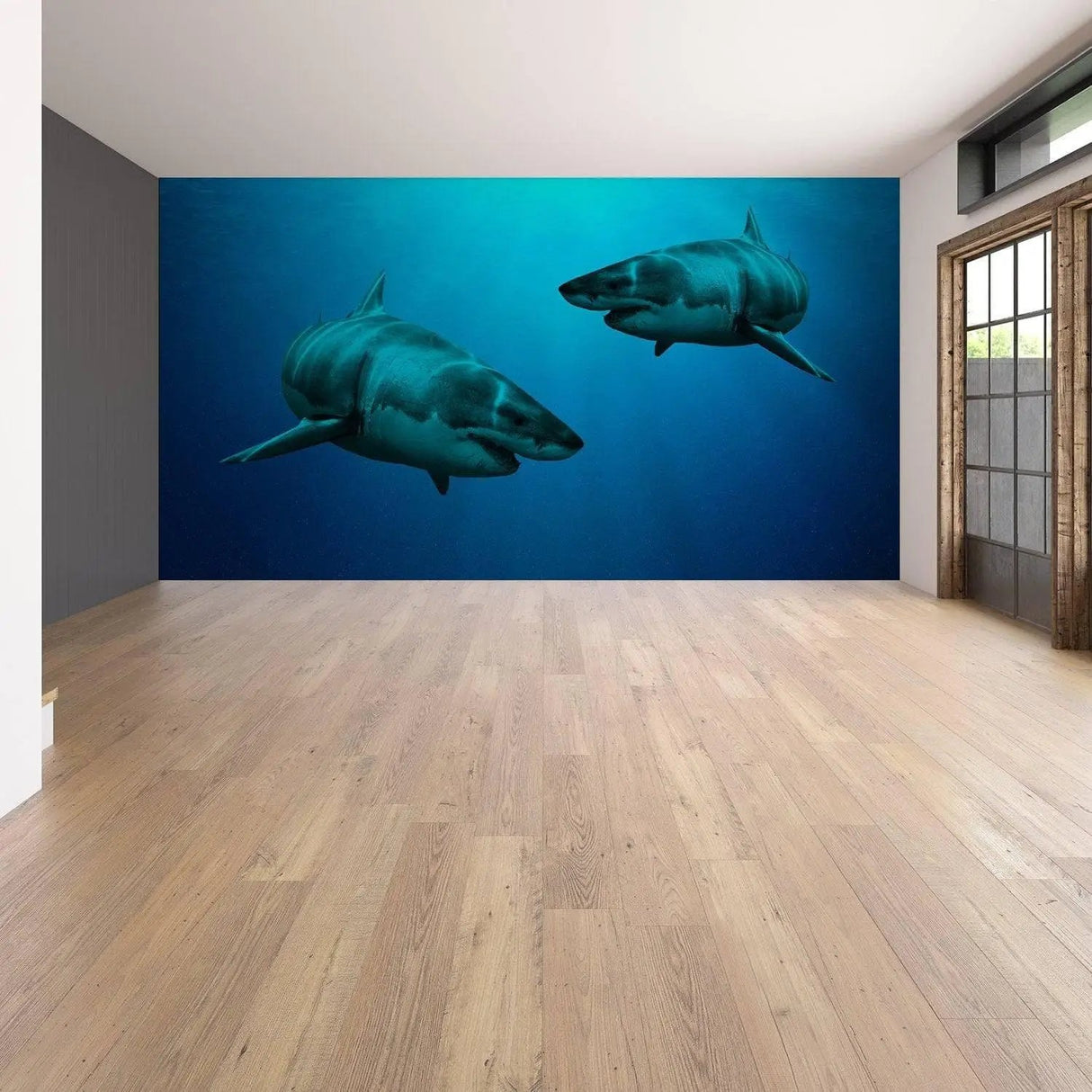 Ocean-themed wall decal featuring two sharks, creating an underwater vibe in a modern room.