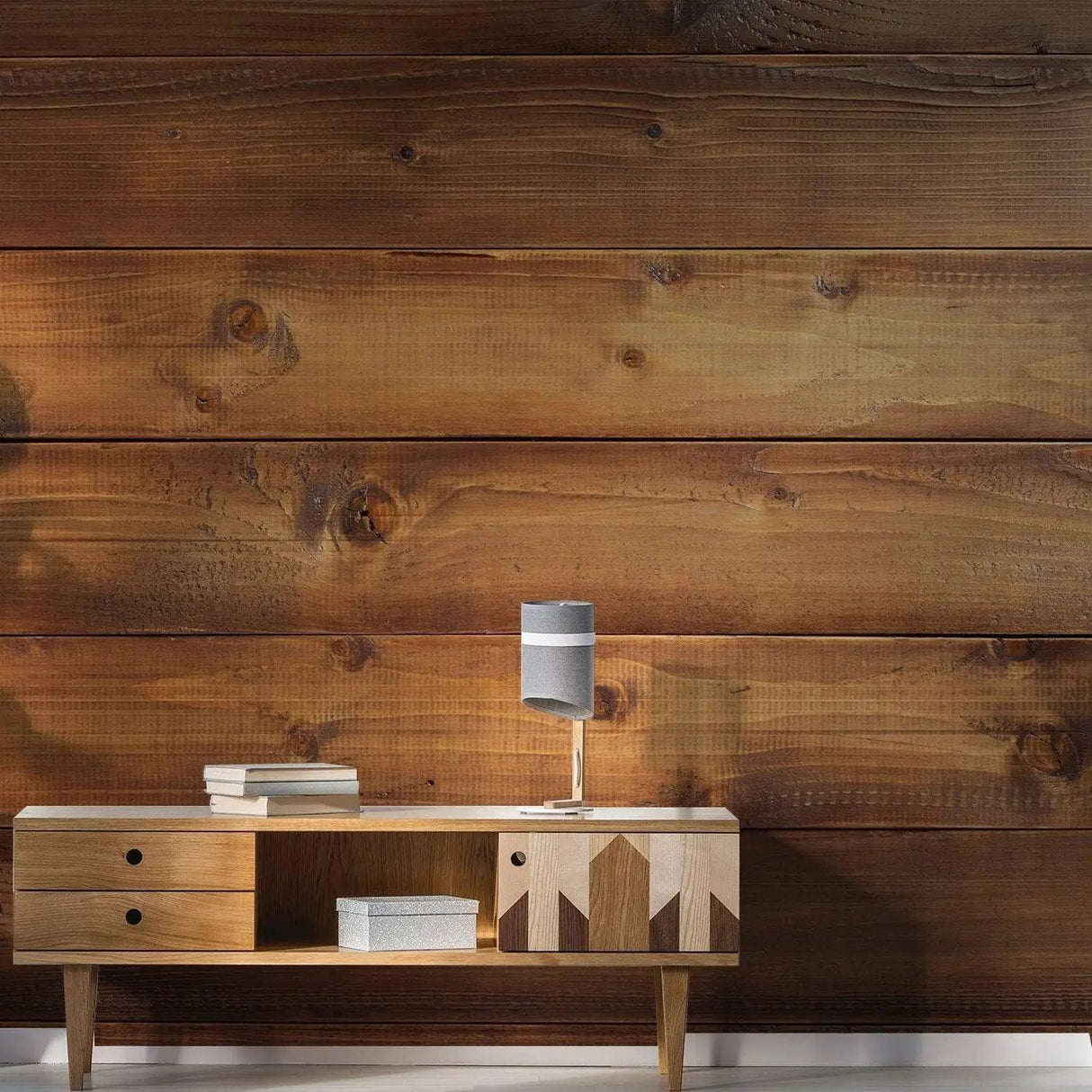 Elegant wooden wall effect with a stylish wooden sideboard and lamp for interior design inspiration.