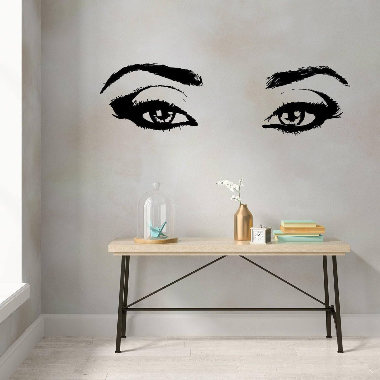 Elegant vinyl wall decal of beautiful eyes with lashes, enhancing interior decor with charm and style.