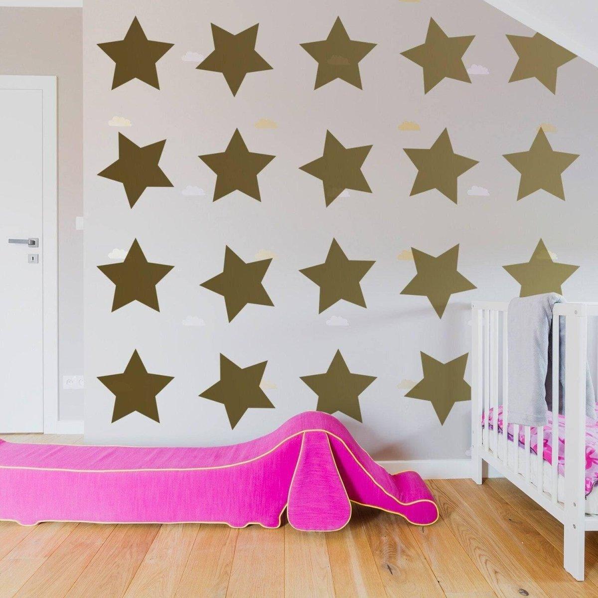 Decorative room featuring 40-pack golden star stickers on the wall, perfect for nursery or child's room decoration.