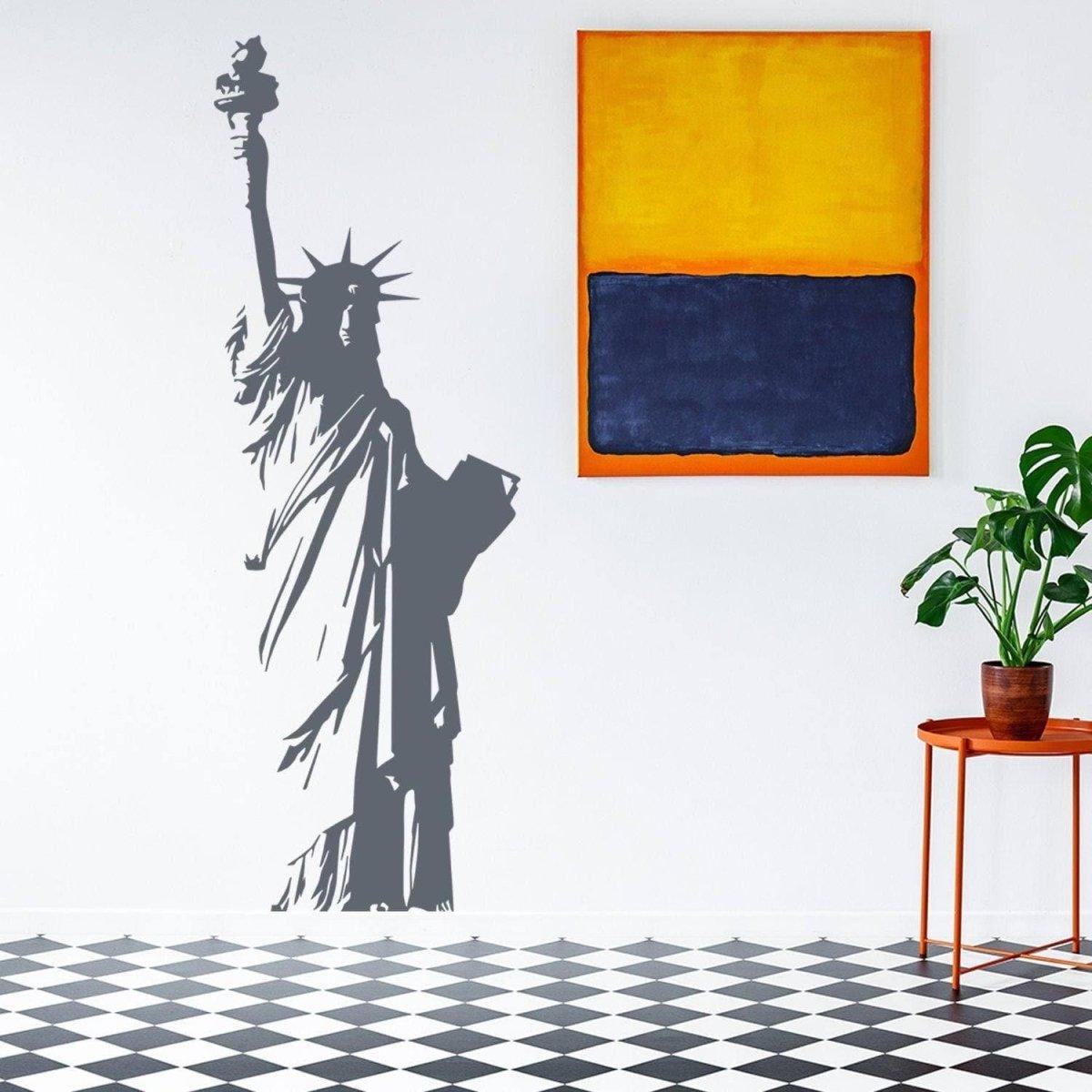 Statue of Liberty vinyl sticker on wall, showcasing American patriotism in a modern indoor setting.