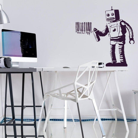 Street art robot vinyl decal applied on a modern workspace wall, featuring a barcode design.
