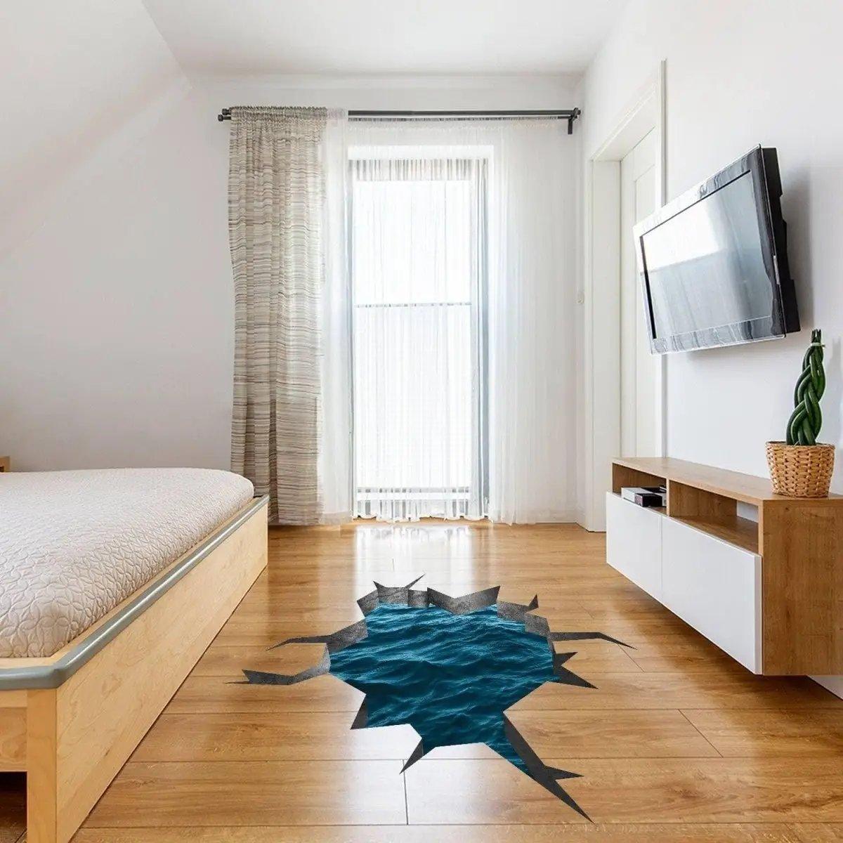 3D blue ocean wall decal creating a porthole view of the sea on a bedroom floor, enhancing interior decor.
