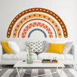 Boho multicolor rainbow wall decal above a modern white sofa, adding a vibrant touch to the decor.