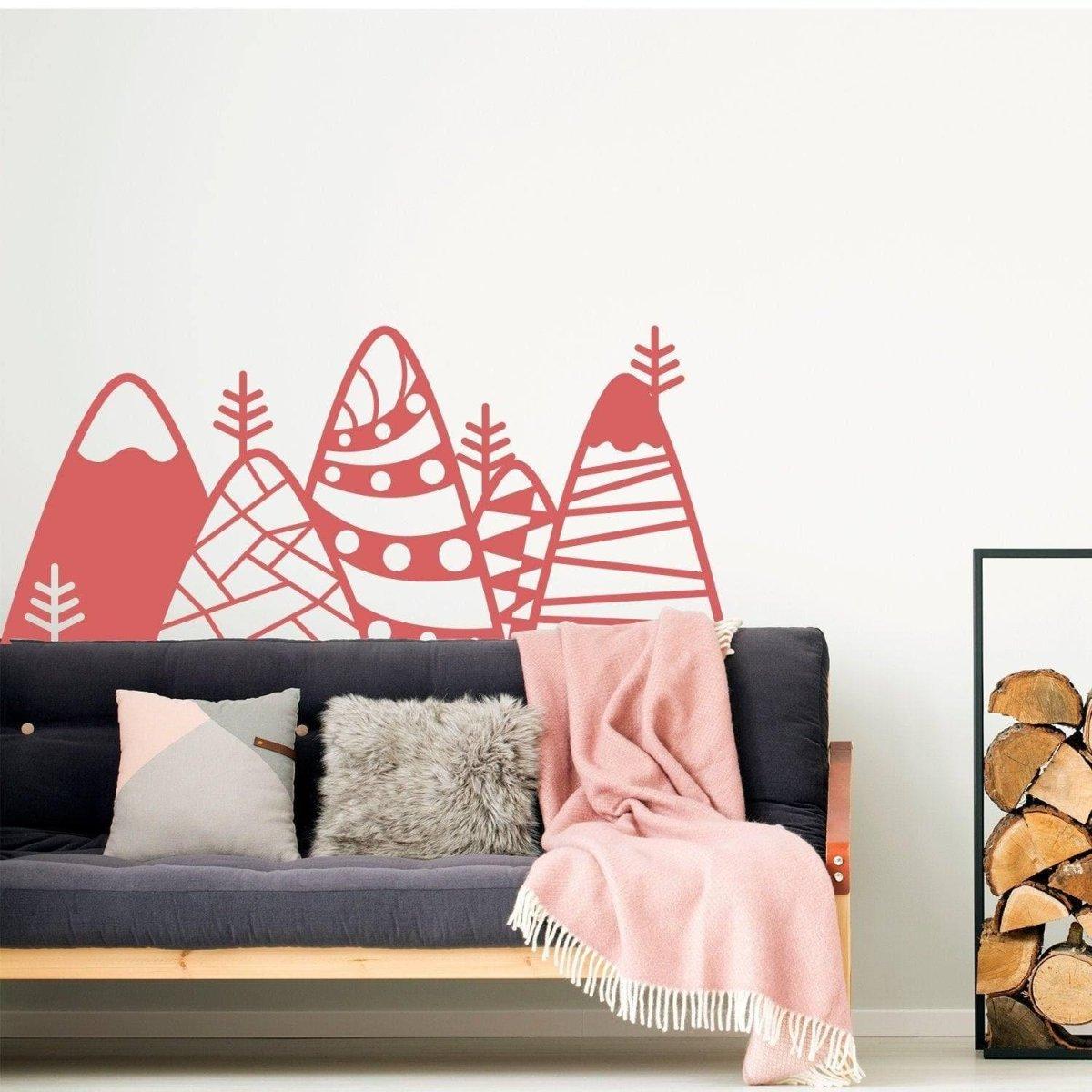 Peaks wall sticker featuring patterned mountain design in red, enhancing a cozy living room decor.