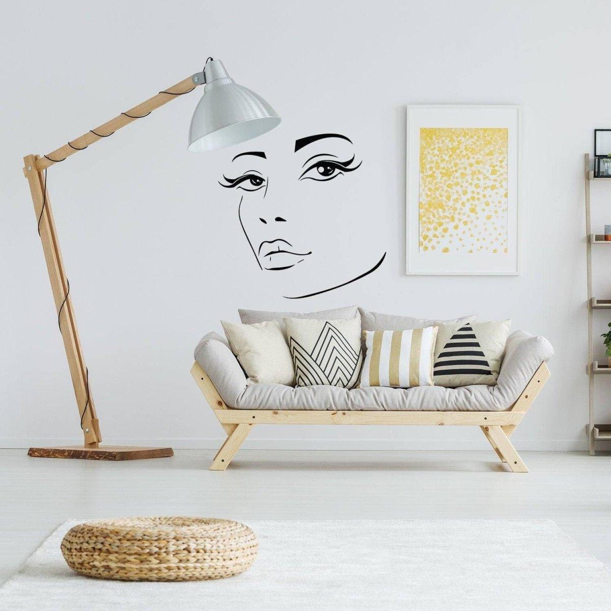 Charming silhouette woman face wall decal in modern living room with stylish decor.