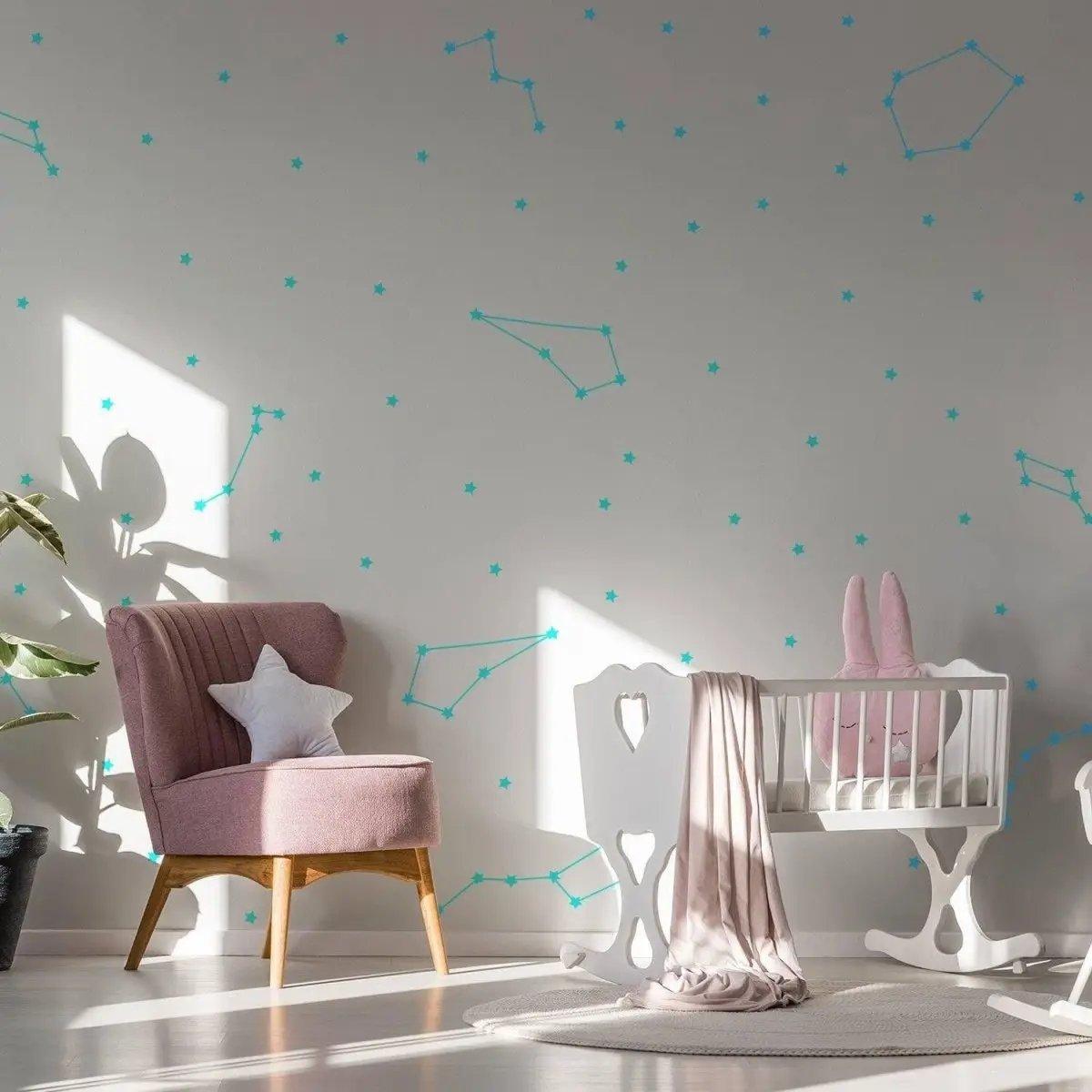 Celestial Dreams vinyl wall stickers featuring constellations in a nursery setting, adding cosmic charm to the decor.