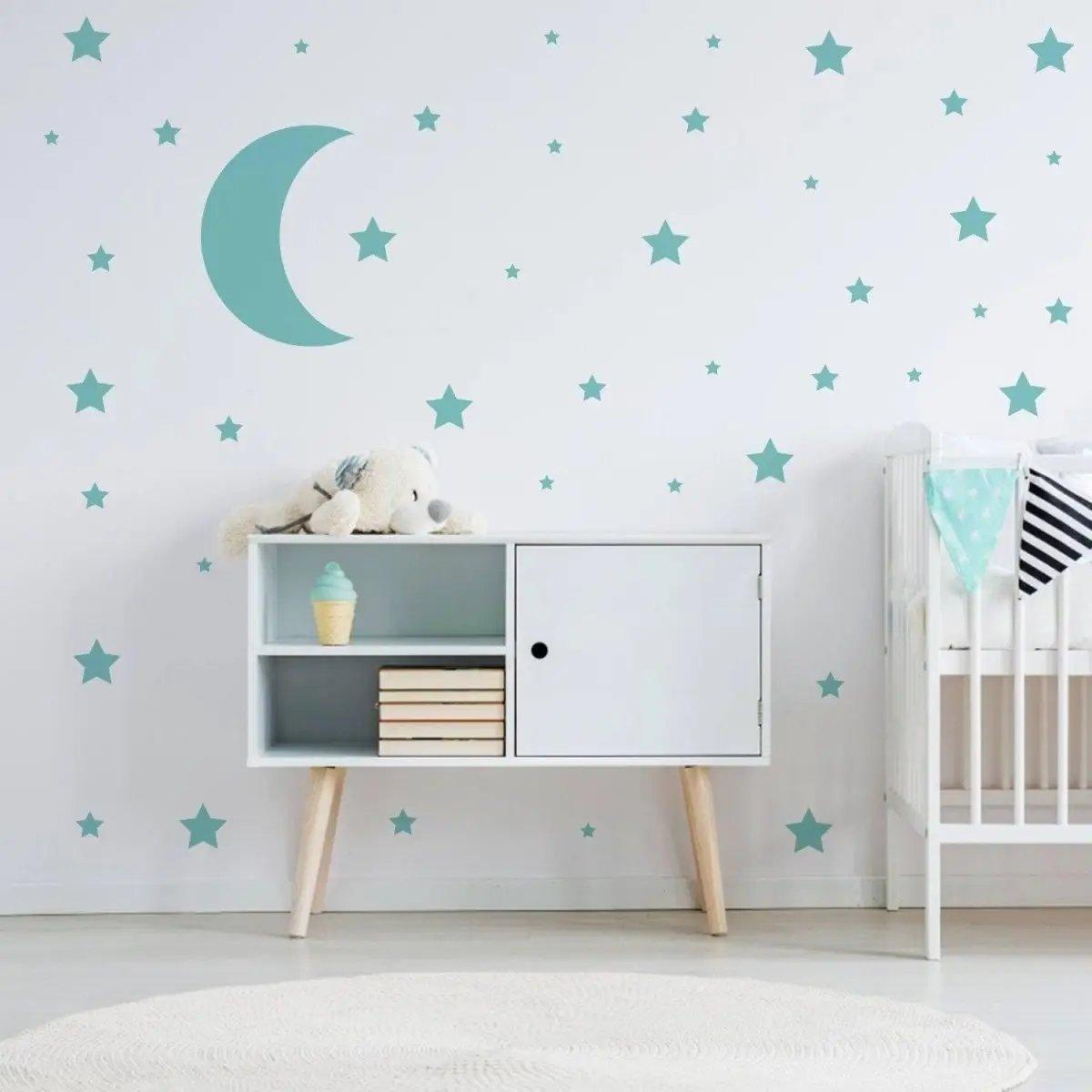 Celestial Dreams wall sticker collection featuring blue moon and stars on a nursery wall.