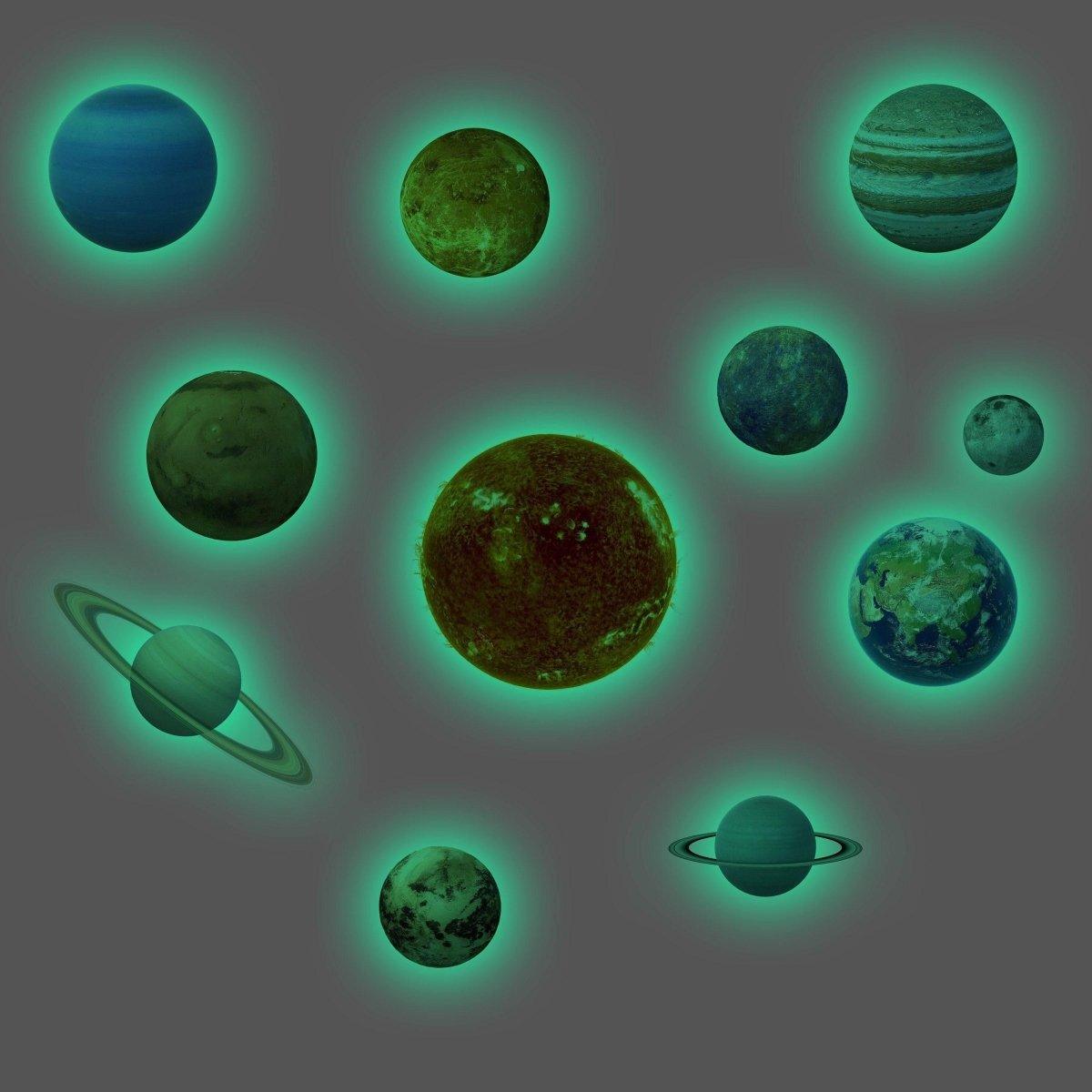 Glow in the dark solar system wall stickers featuring planets and rings, perfect for astronomy-themed decor.