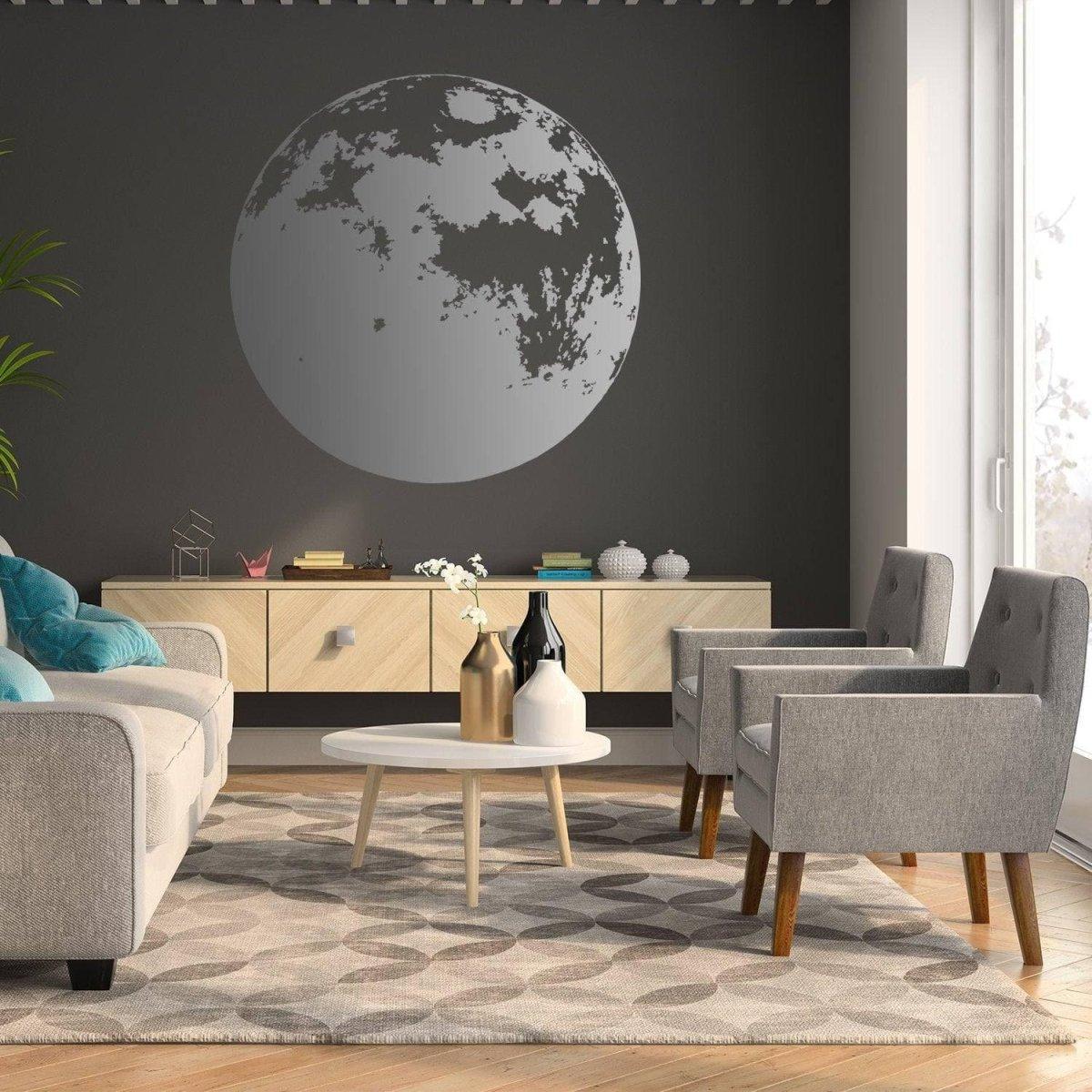 Moon phase wall decal featured in a modern living room with gray walls and stylish furniture.