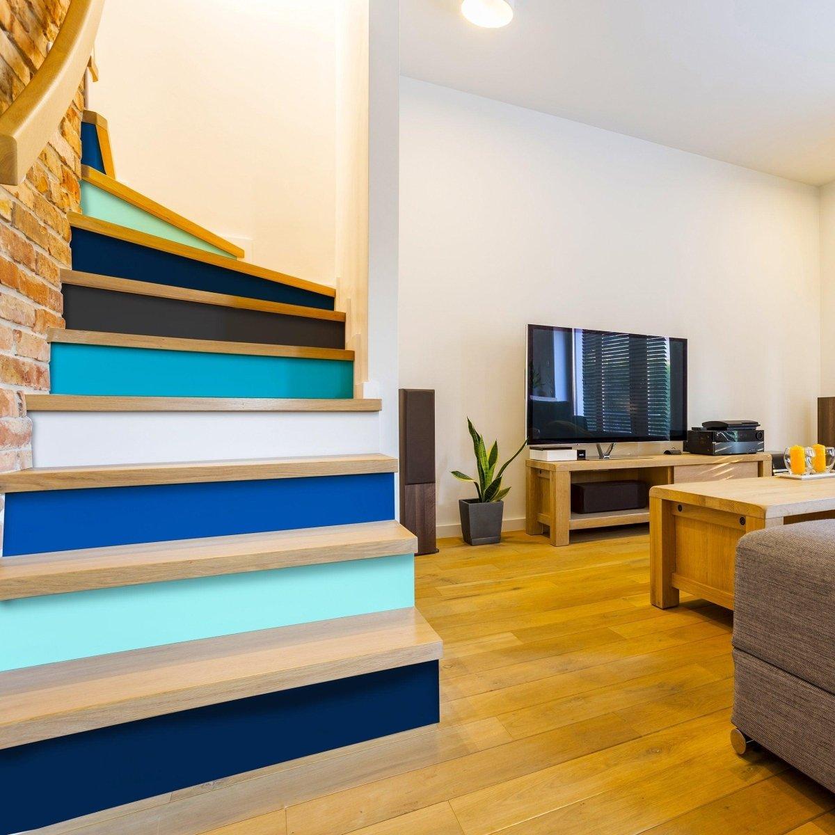 Vibrant staircase featuring gradient color riser stickers for a stylish home makeover.