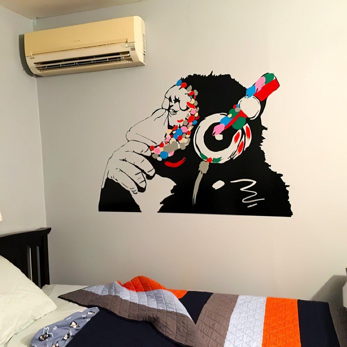 Cool monkey wall decal with headphones, perfect for kids' room decor, inspired by Banksy street art.