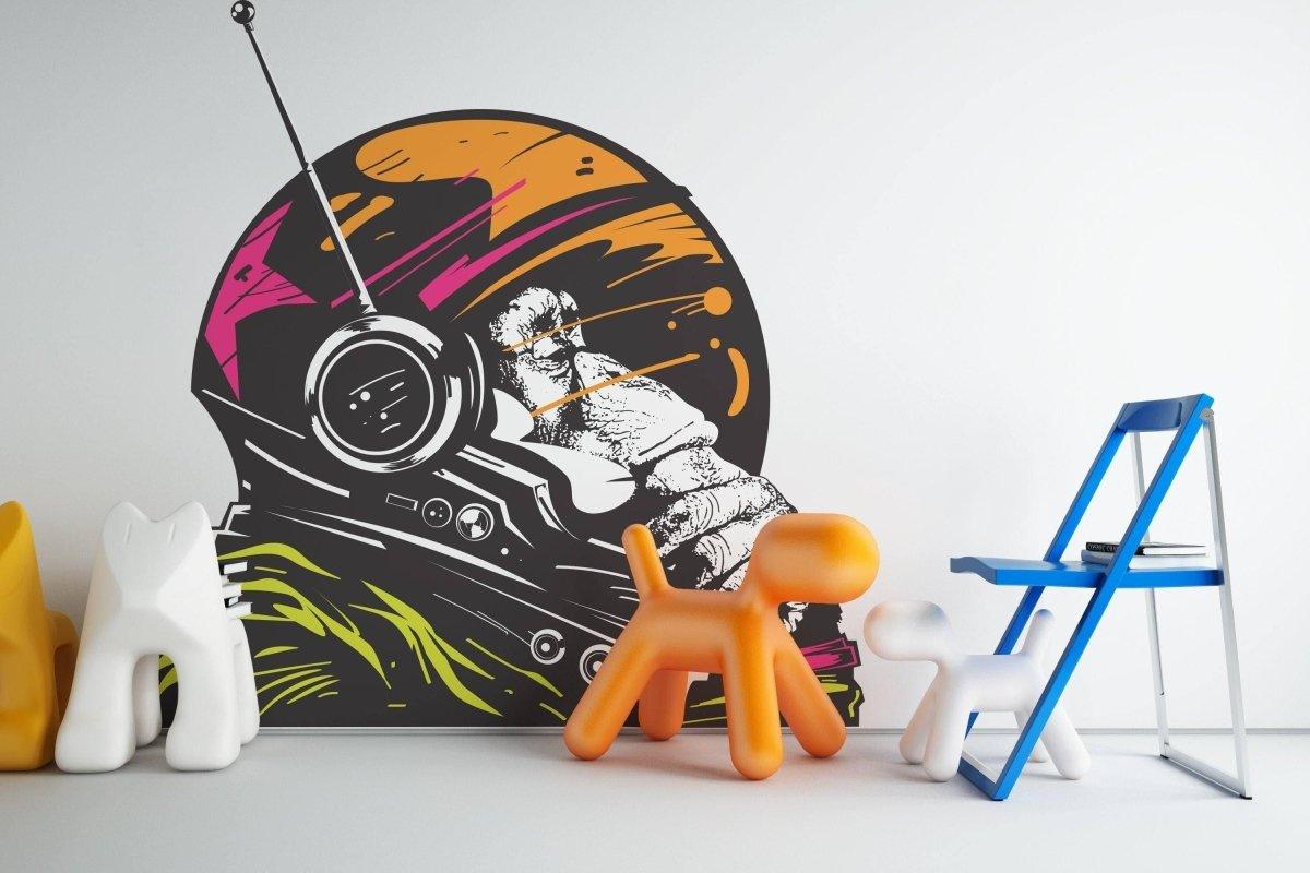 Cosmic Chimp decorative wall decal featuring a space monkey design in a vibrant room setting.