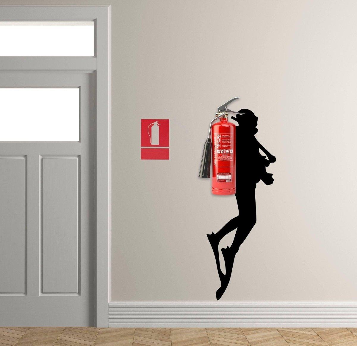Scuba diver wall sticker with a fire extinguisher on a wall, adding a unique touch to home decor.