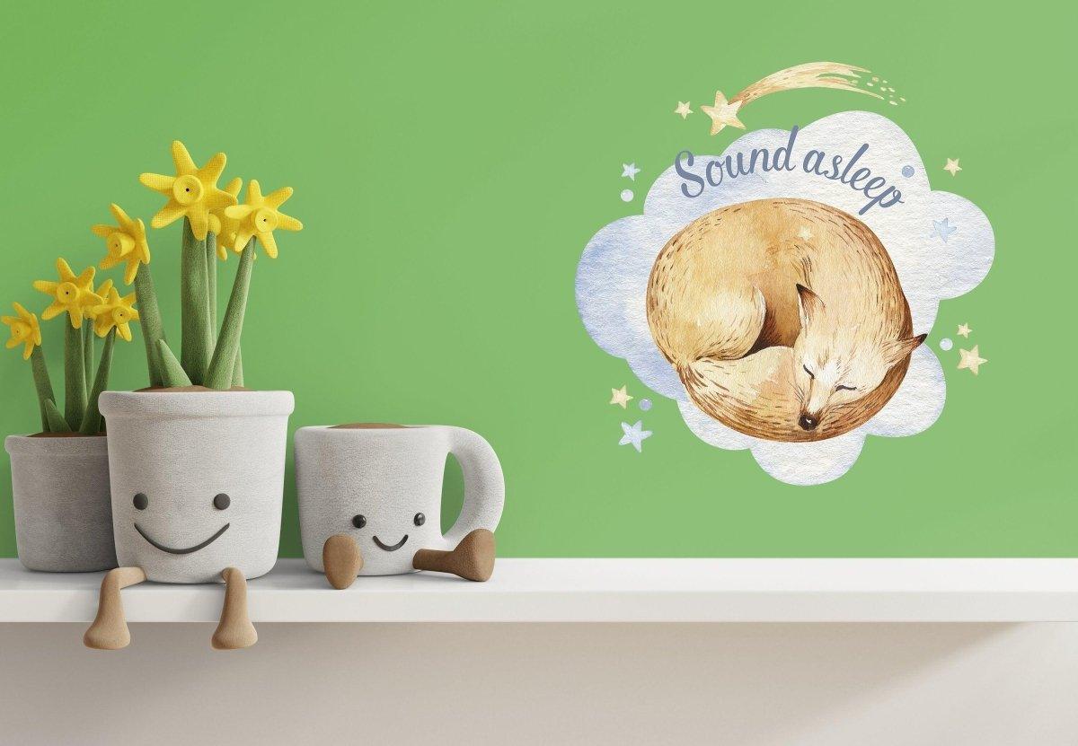 Adorable fox sleeping on a cloud wall sticker with the text 'Sound asleep', perfect for children's nursery decor.