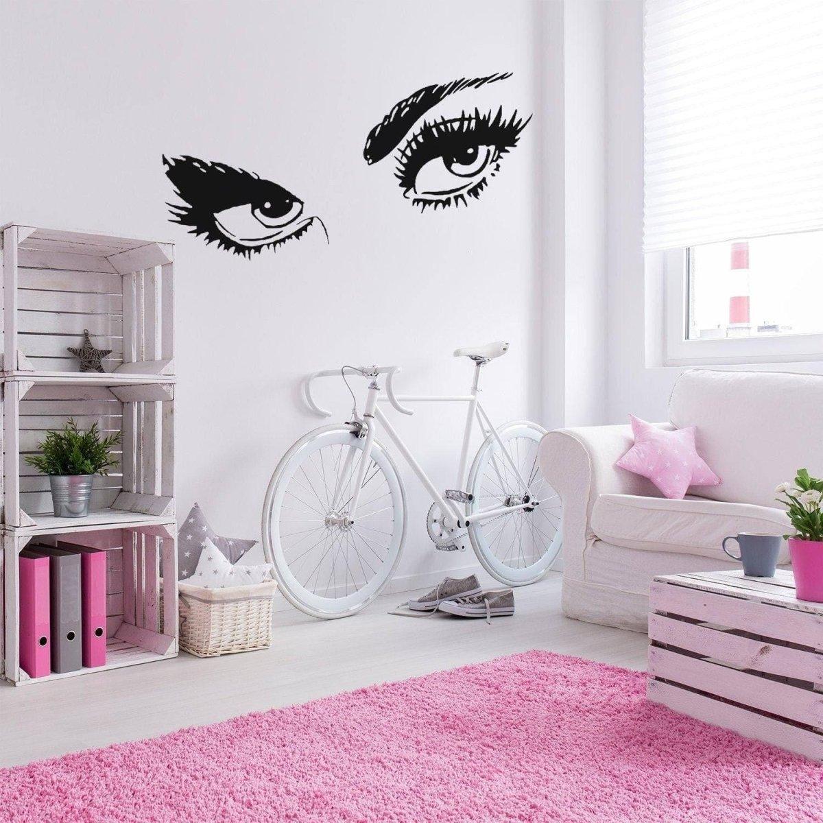 Chic woman eye vinyl wall decal in a stylish living room, enhancing decor with elegant aesthetic.