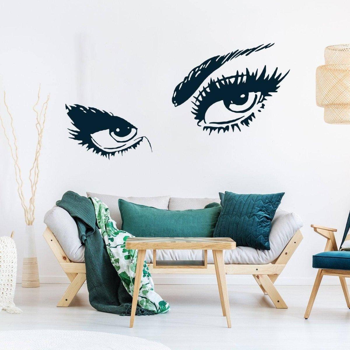 Chic vinyl wall decal of woman’s eyes, enhancing a modern living space with elegant wall art.