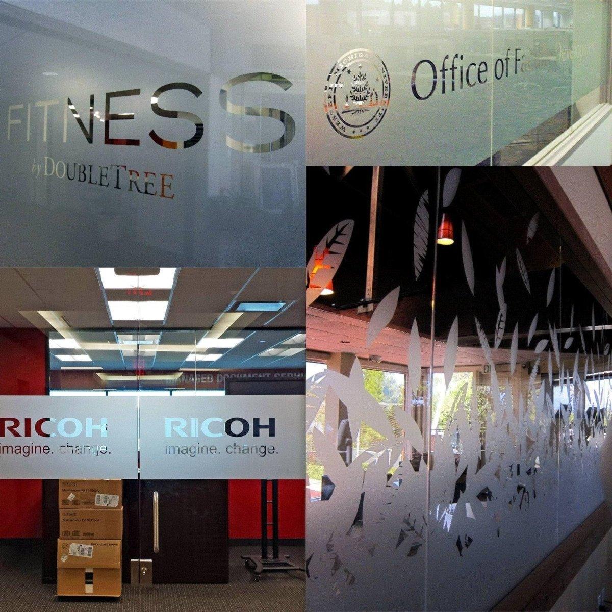Frosted vinyl stickers on glass windows displaying business names and elegant designs, enhancing privacy and style.