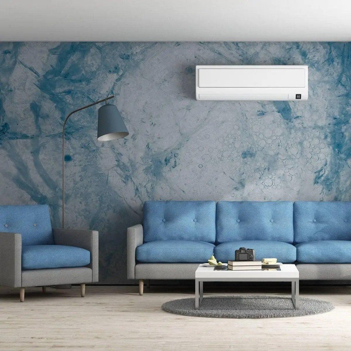 Living room featuring self-adhesive blue marble effect wallpaper with modern grey furniture.