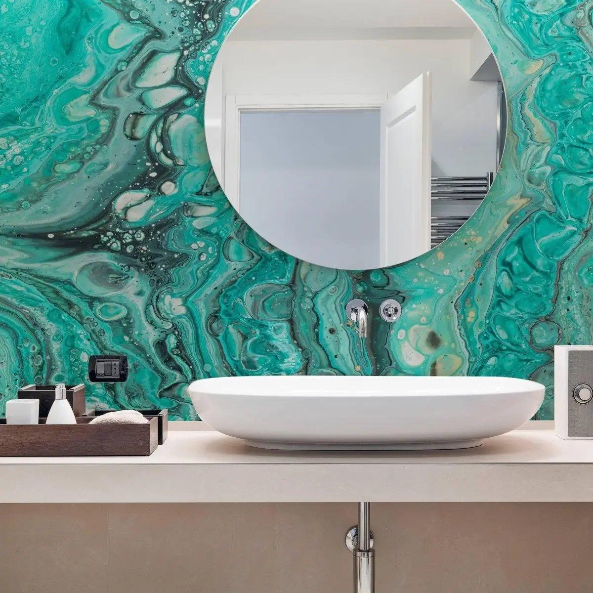 Luxurious self-adhesive marble pattern wallpaper in a modern bathroom with round mirror and white sink.