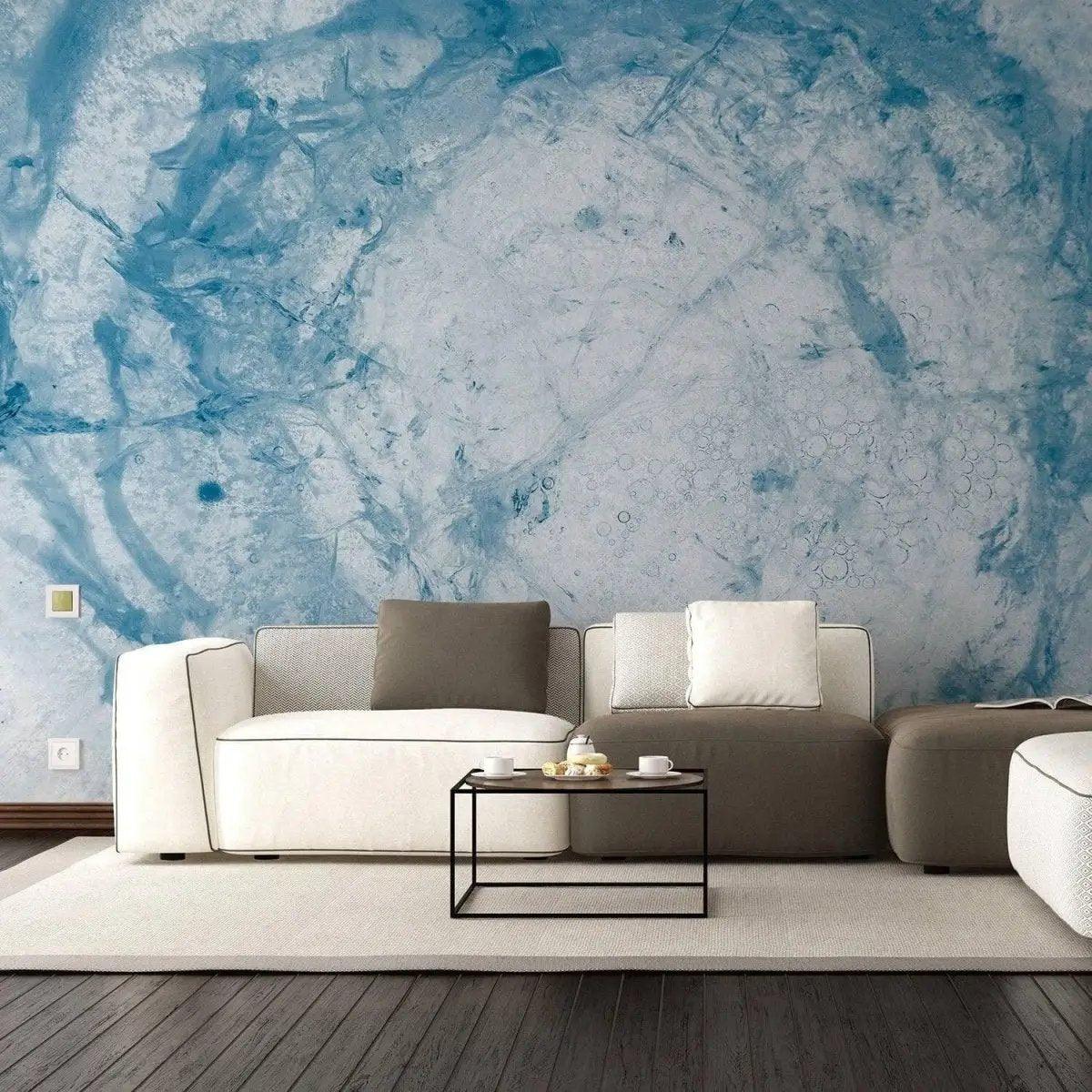 Stylish living room featuring blue marble effect wallpaper and modern furniture, perfect for home transformation.
