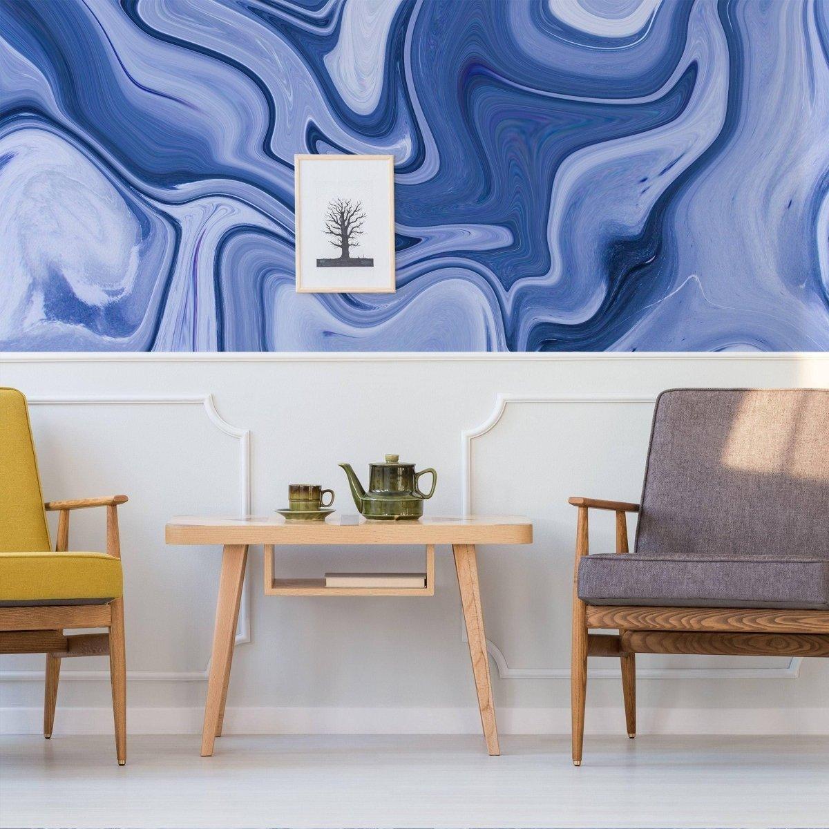 Stylish living room with a marble wall mural, modern furnishings, and artistic decor.