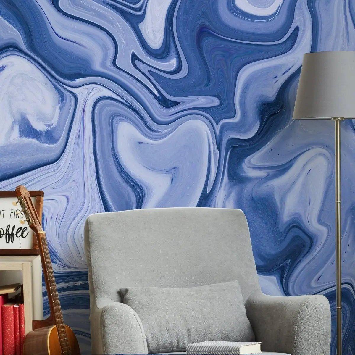 Elegant blue marble wall film creating a stylish backdrop in a chic living room with modern decor.