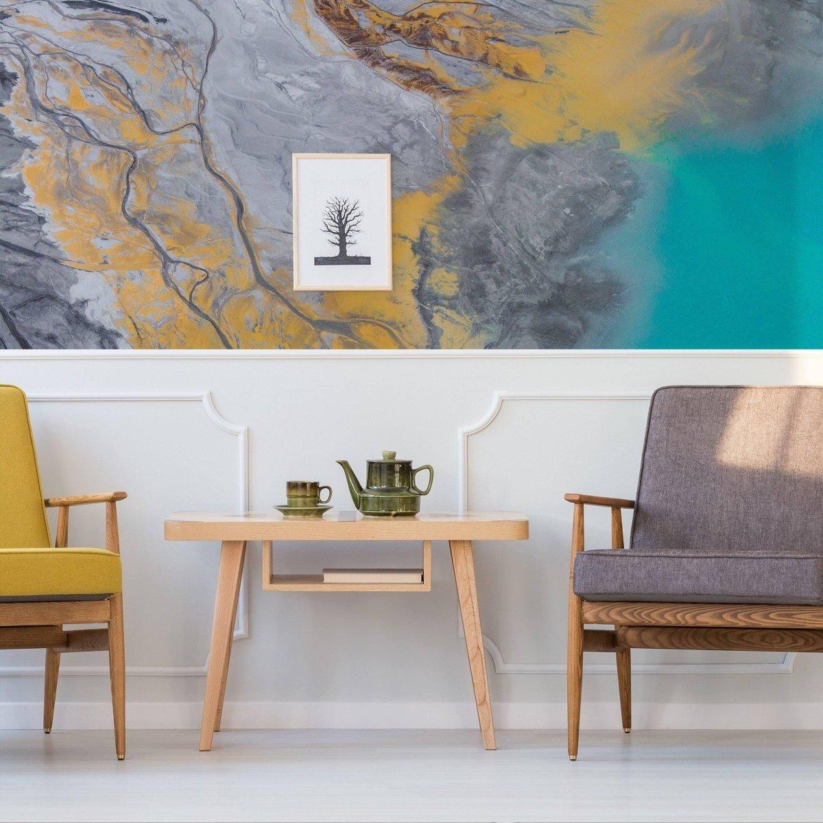 Chic interior featuring self-stick marble wall film, stylish chairs, and a minimalist table with decor.