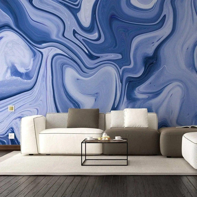 Modern living room featuring elegant blue marble wall design with a cozy sofa and coffee table.