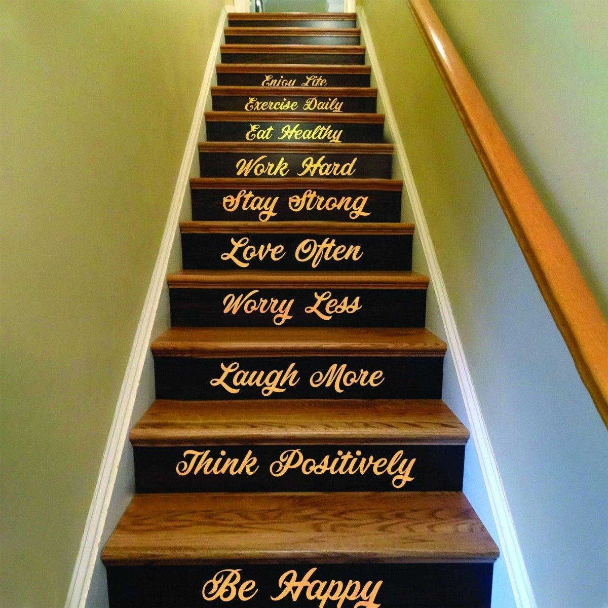 Stylish staircase with motivational vinyl decal quotes promoting positivity and wellness.