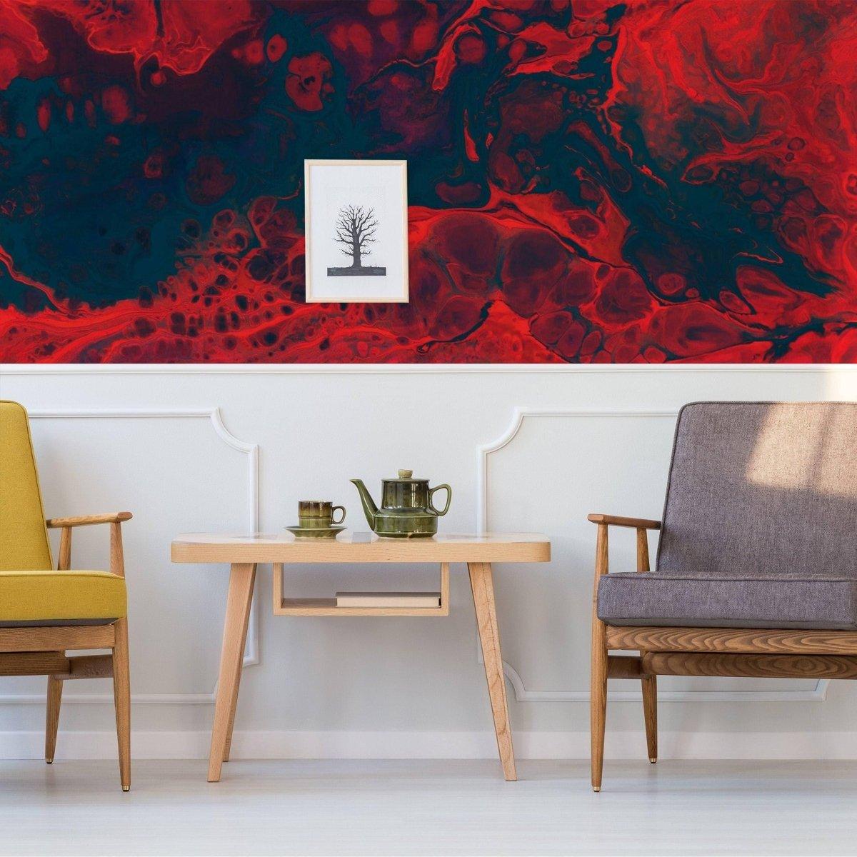 Chic faux stone wallpaper with red and black design in modern living room setting featuring yellow and gray chairs.