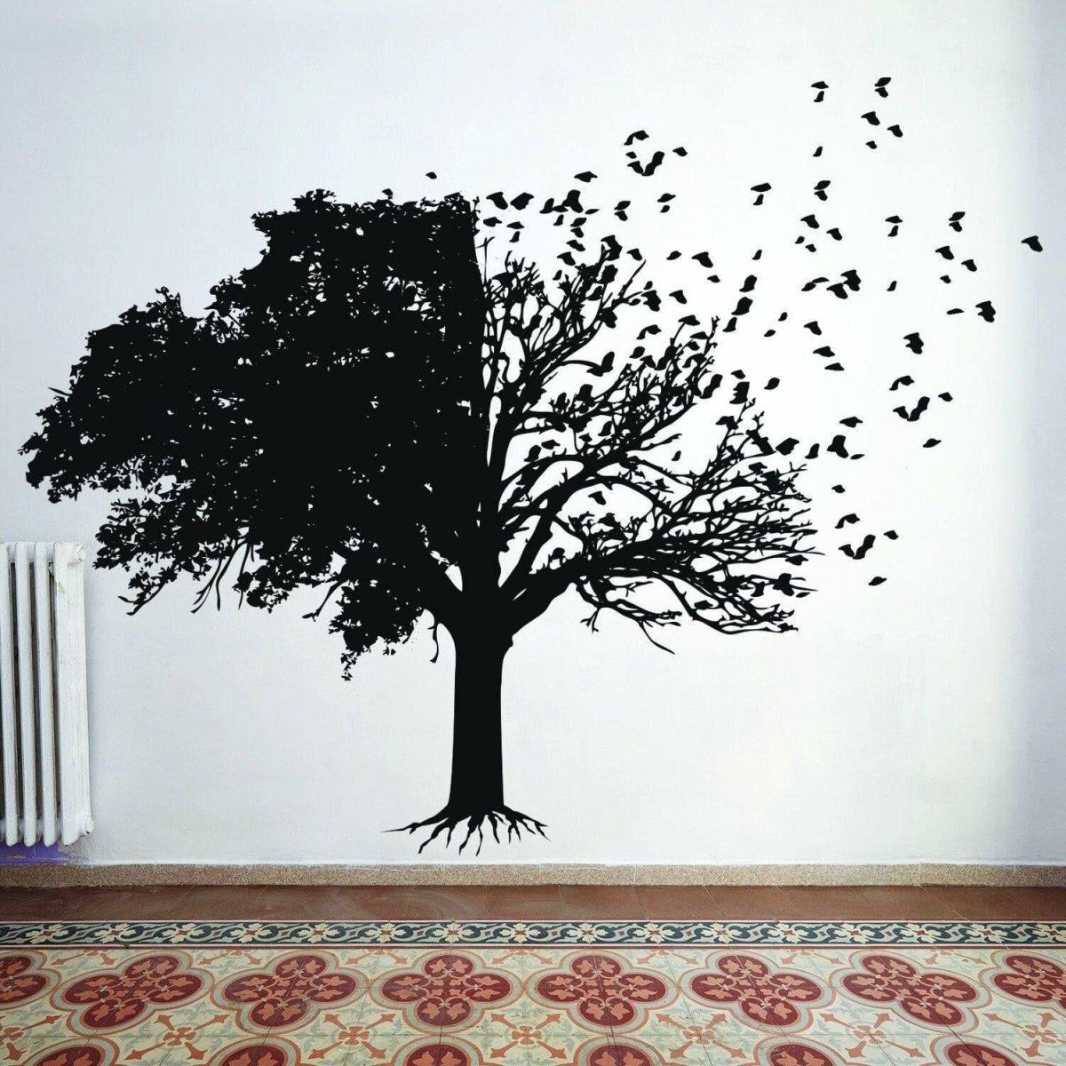 Chic tree wall sticker in black silhouette design with birds and branches, perfect for home decor.
