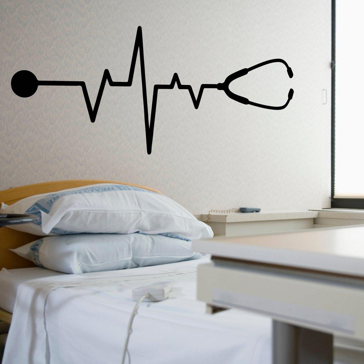 Vinyl decal of a heartbeat line with a stethoscope on a hospital room wall, showcasing healthcare themes.