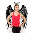 Woman posing in front of angel wings wall decal, wearing a red tank top, showcasing ethereal wall art.