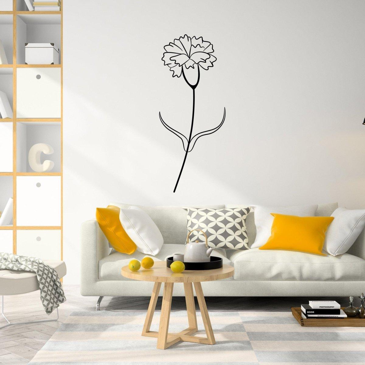 Stylish birth flower decal sticker of a carnation on a white wall in a modern living room setting.