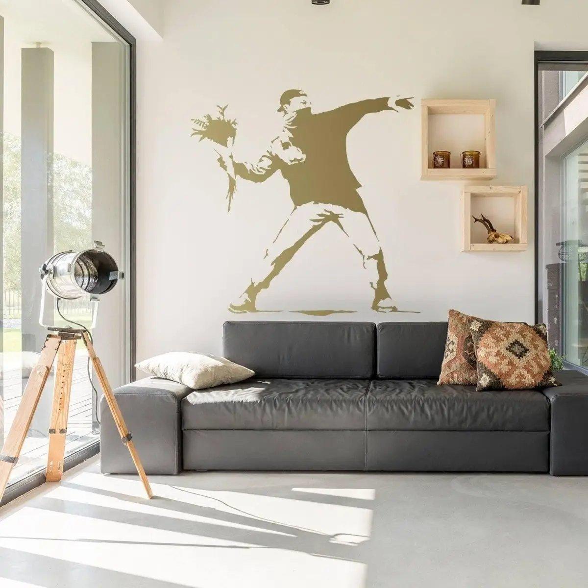 Artistic floral expression wall decal featuring a figure throwing flowers on a stylish living room wall.