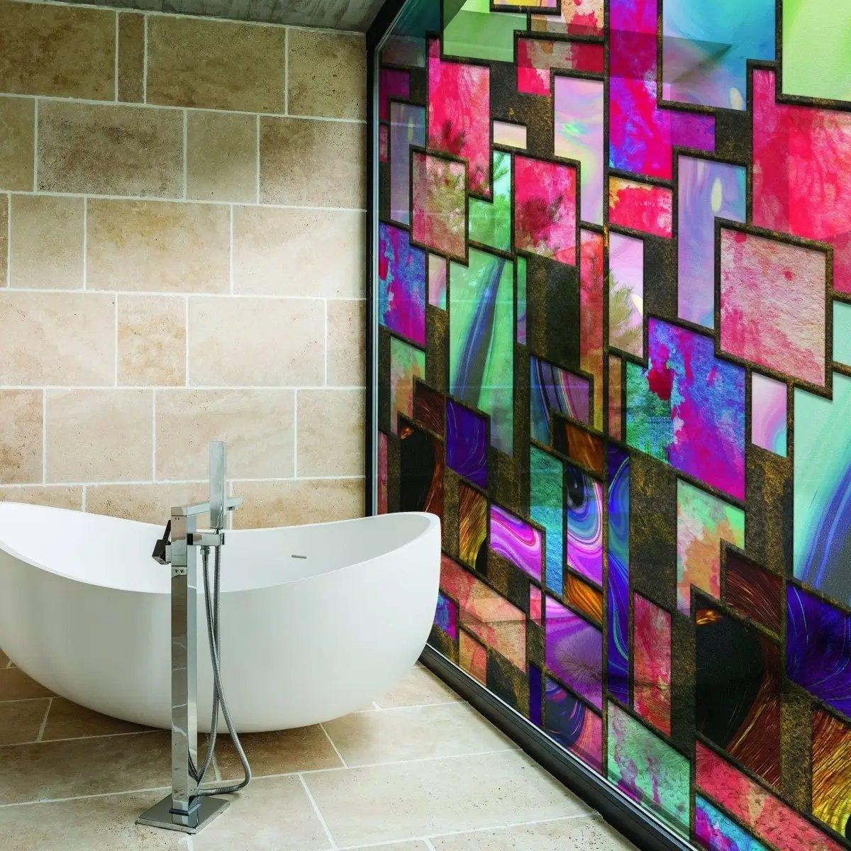 Frosted privacy window film in a colorful geometric design, enhancing elegance and privacy in a modern bathroom.